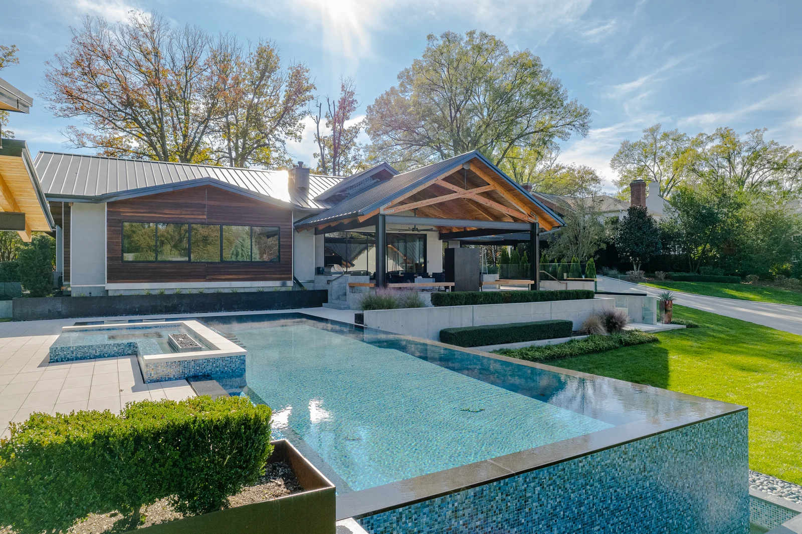 Modern residence and pool photographed in clear daylight