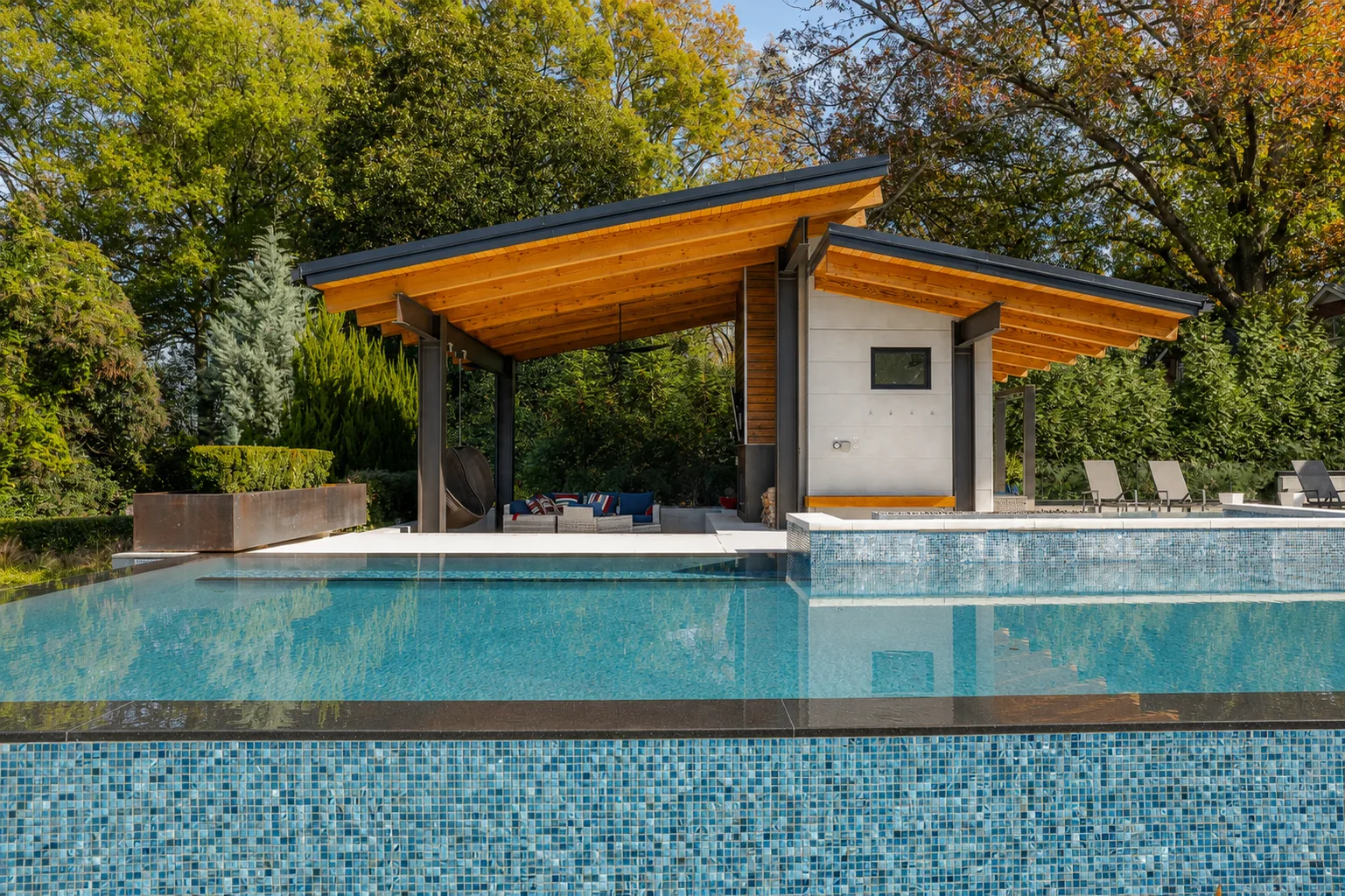 Modern pool and architectural cabana photographed by Picture Your Property