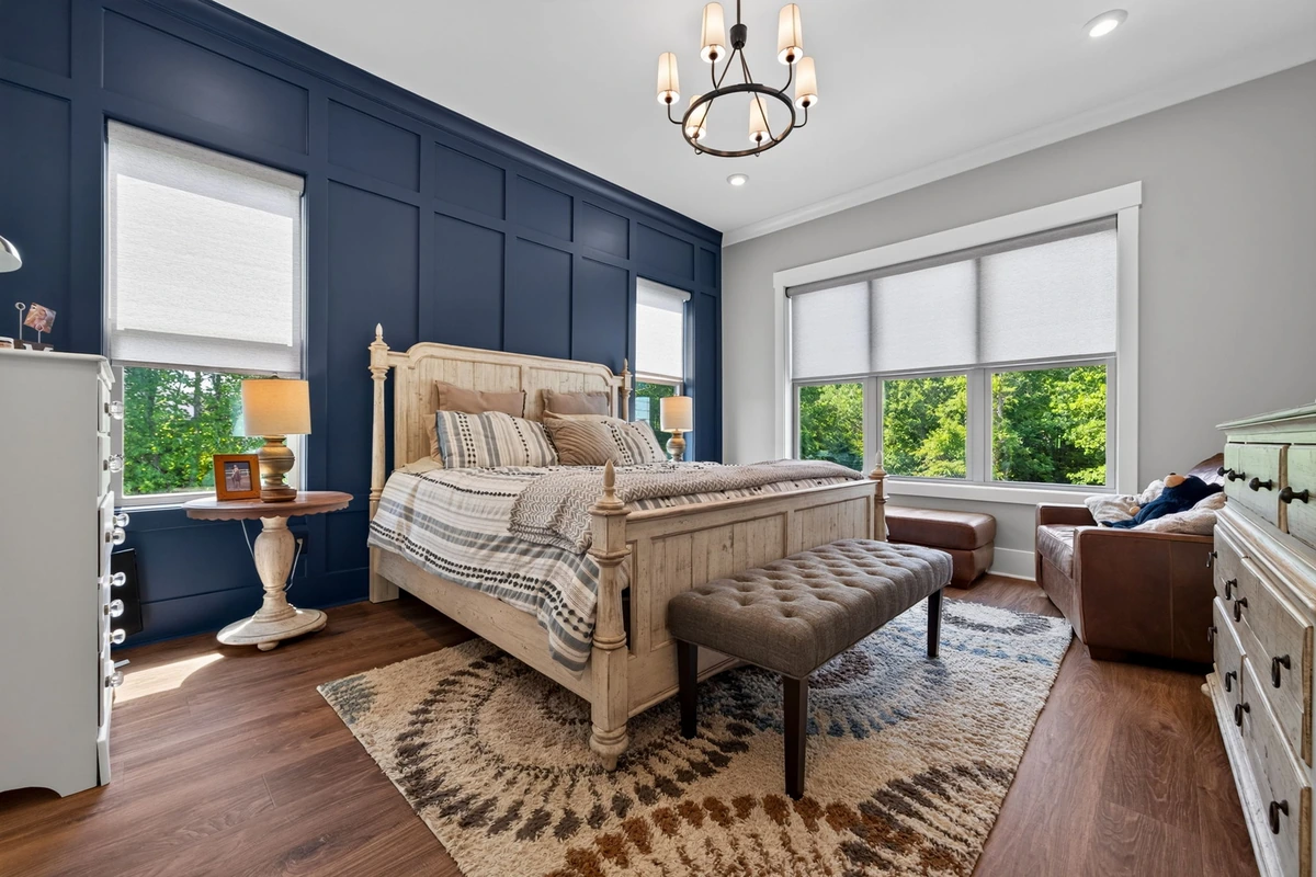 Clayton primary bedroom with neutral finishes and natural light