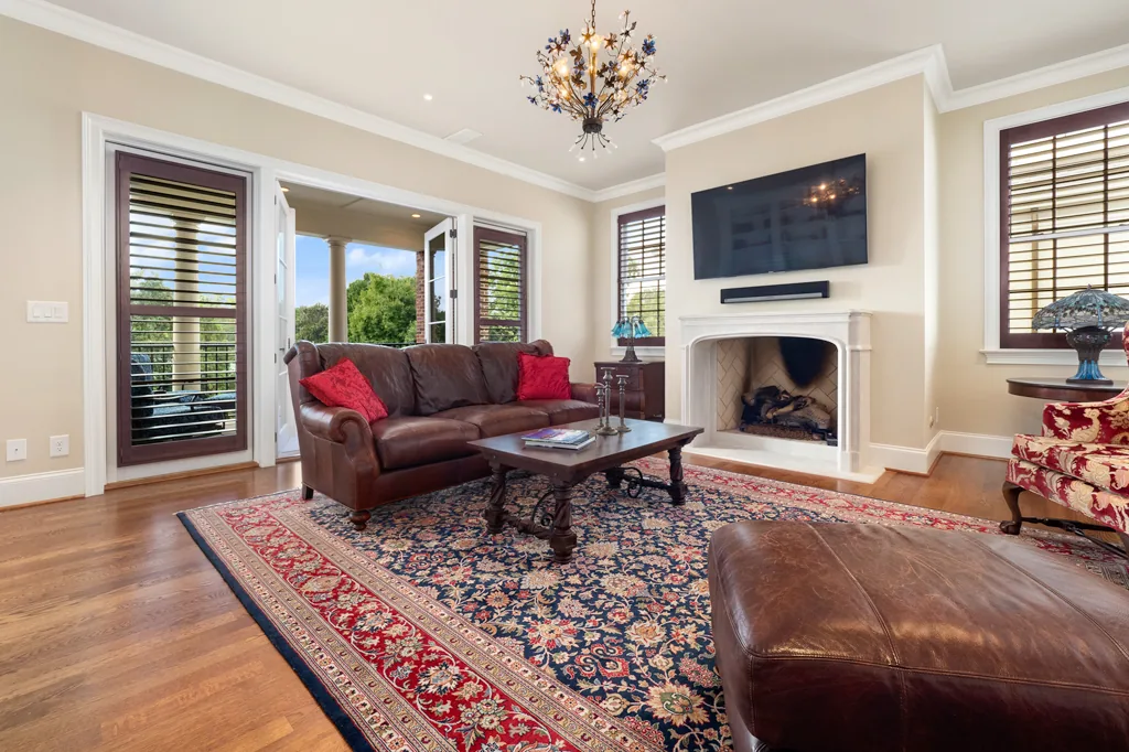 Prepared living room with inviting seating, tidy surfaces, and open floor space