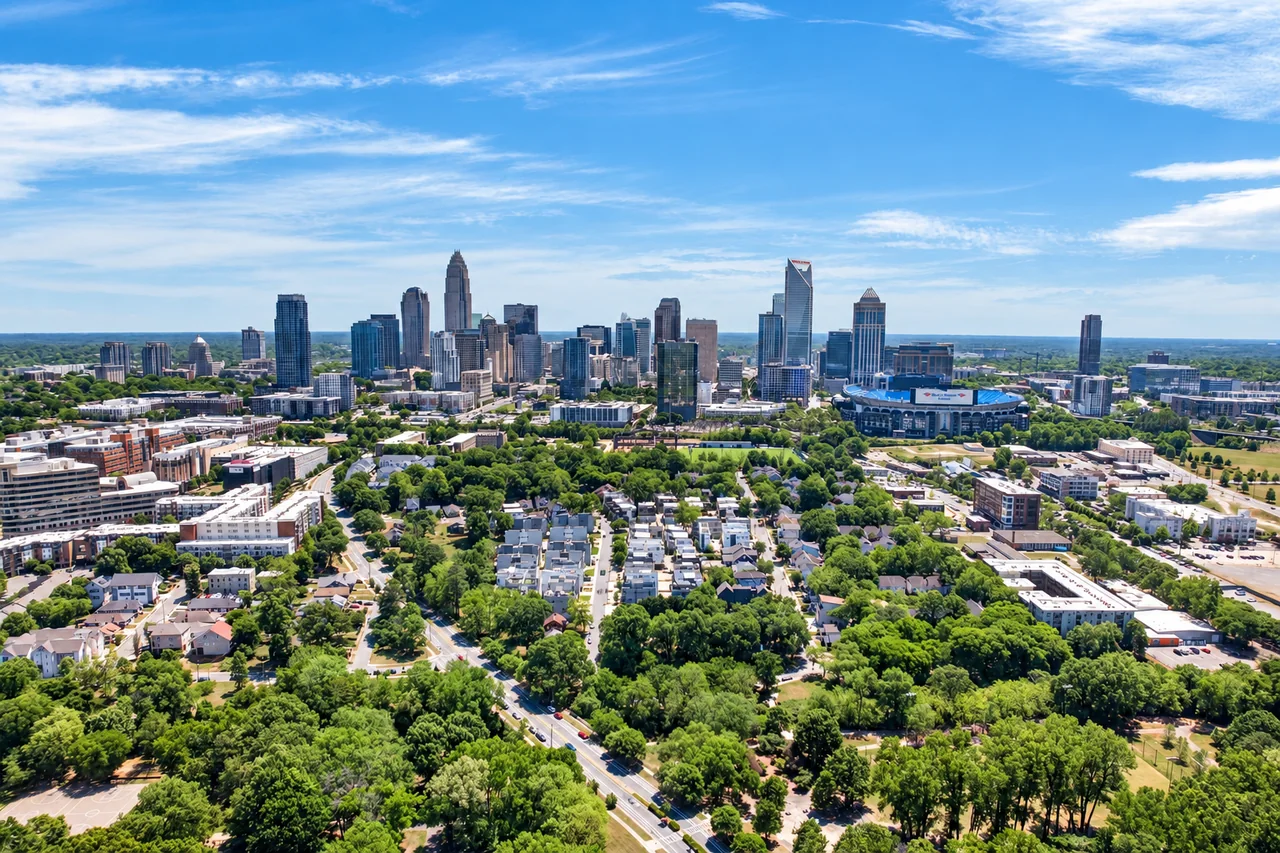 Charlotte skyline with Bank of America Stadium and surrounding neighborhoods