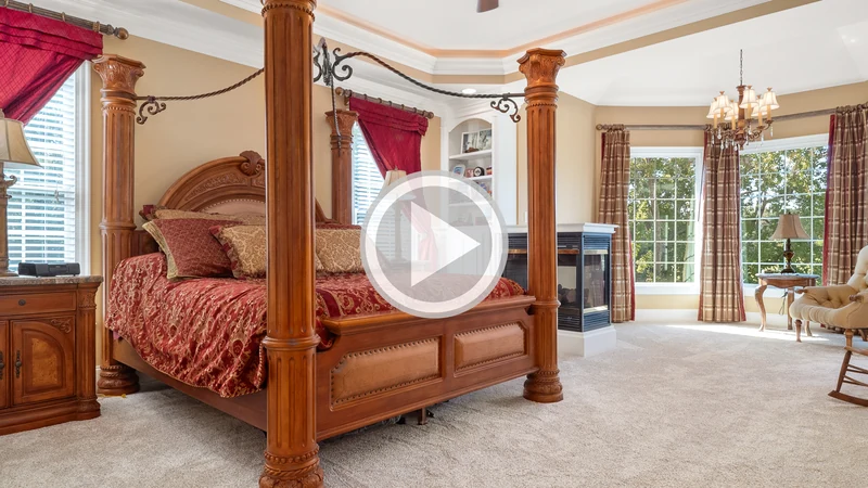 Bedroom listing video preview with playback control