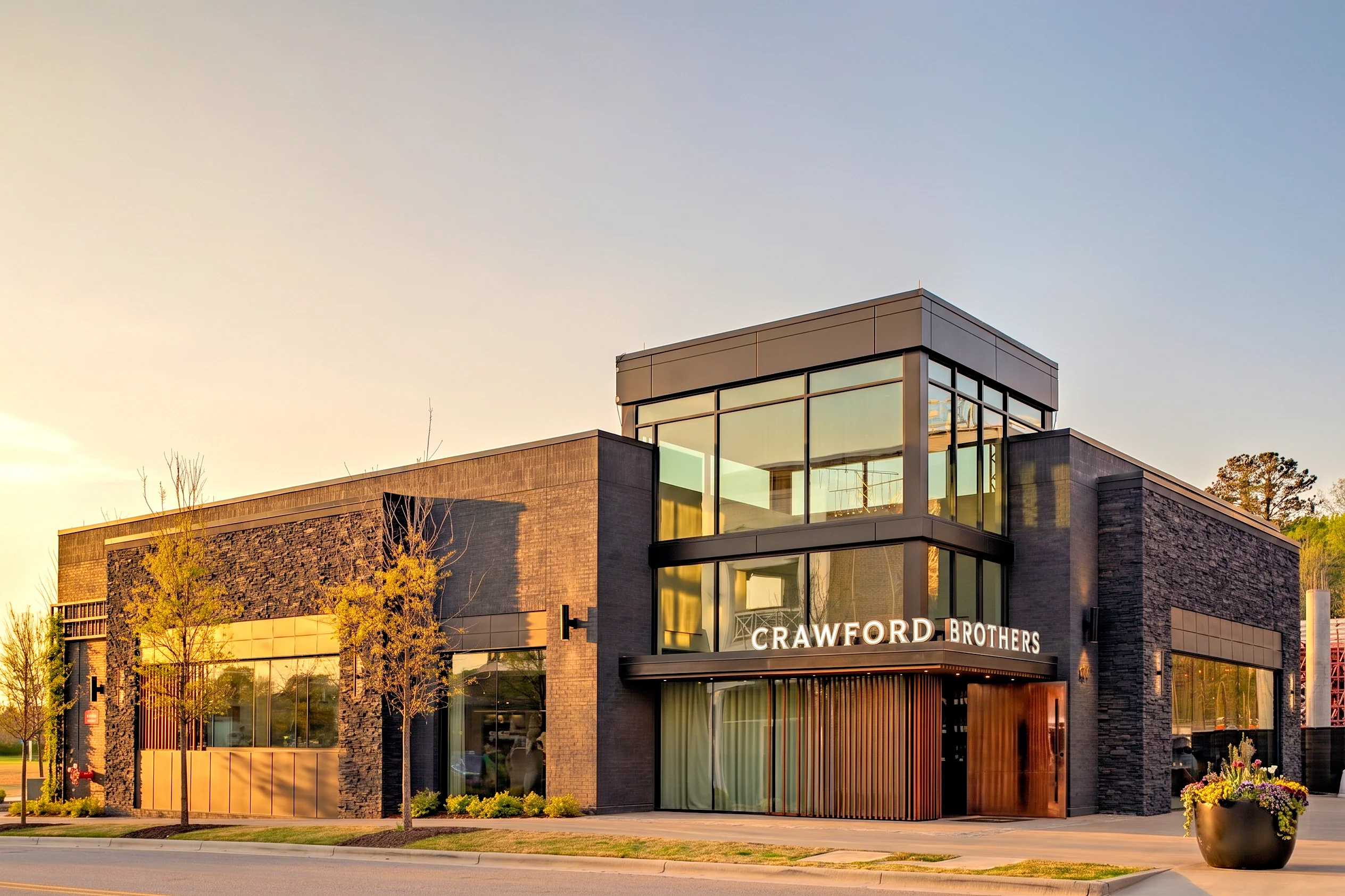 Contemporary commercial building photographed to show brick, glass, and clean structural lines