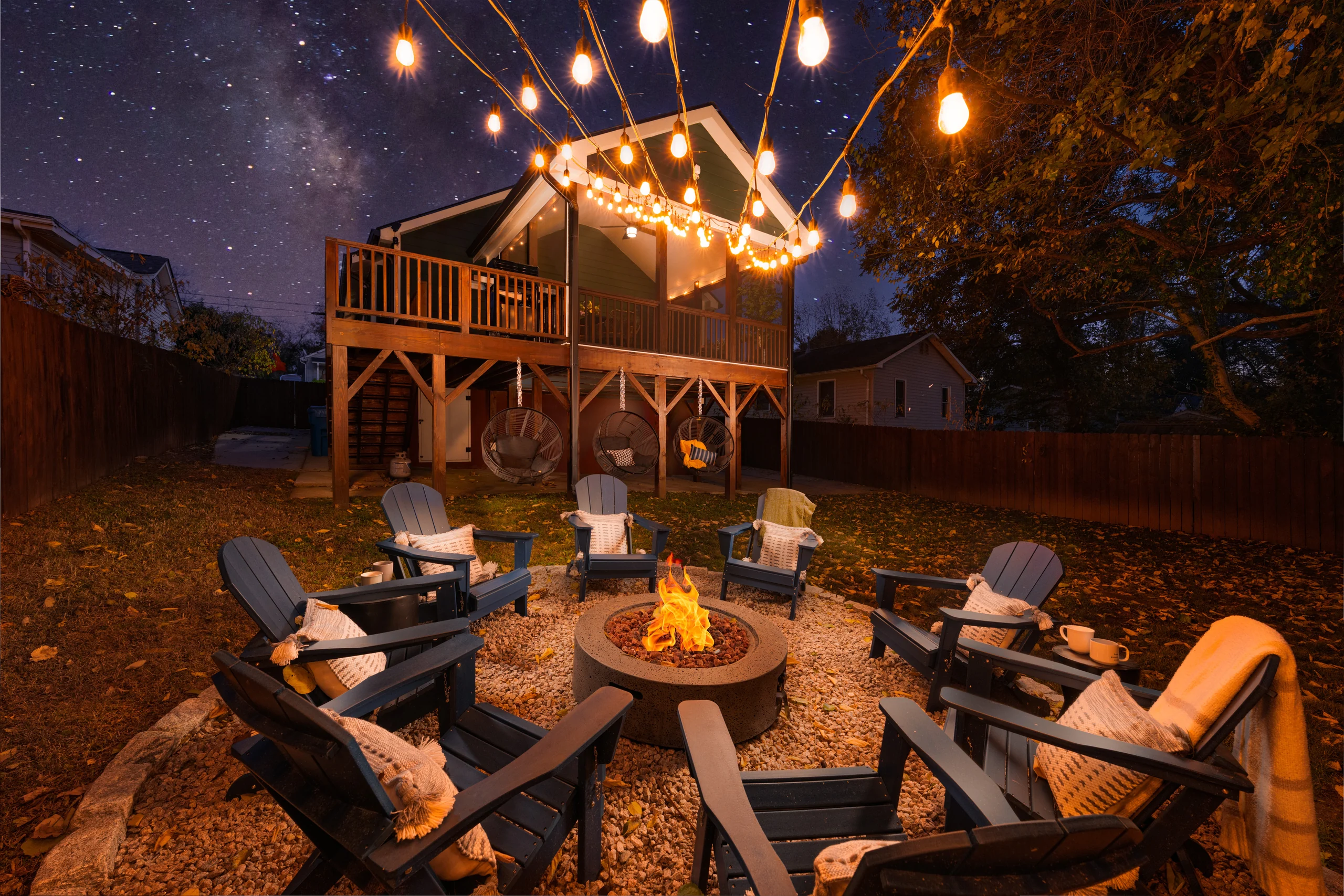 Outdoor rental amenity with firepit seating and elevated gathering space