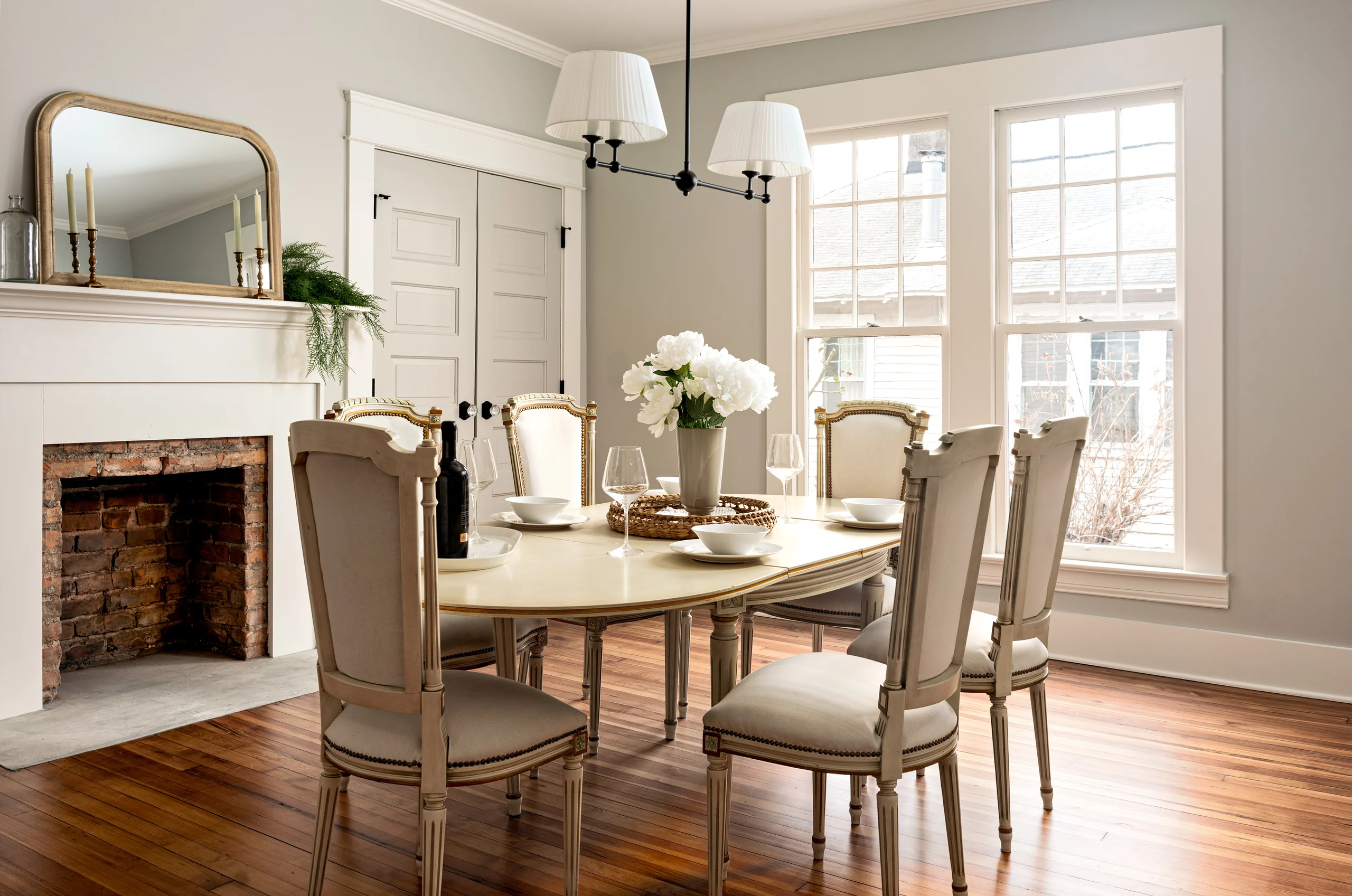 Bright rental dining room staged for guest and tenant marketing